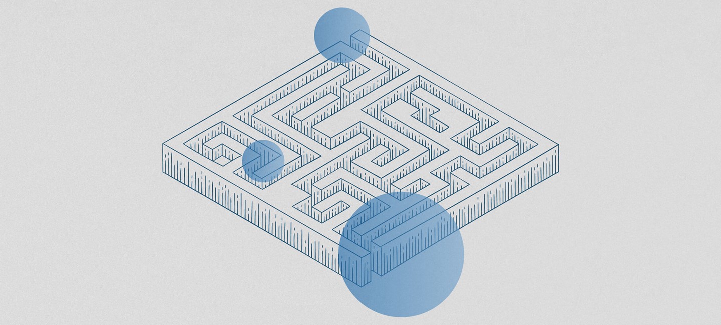 Illustration of a labyrinth with three blue dots on it.